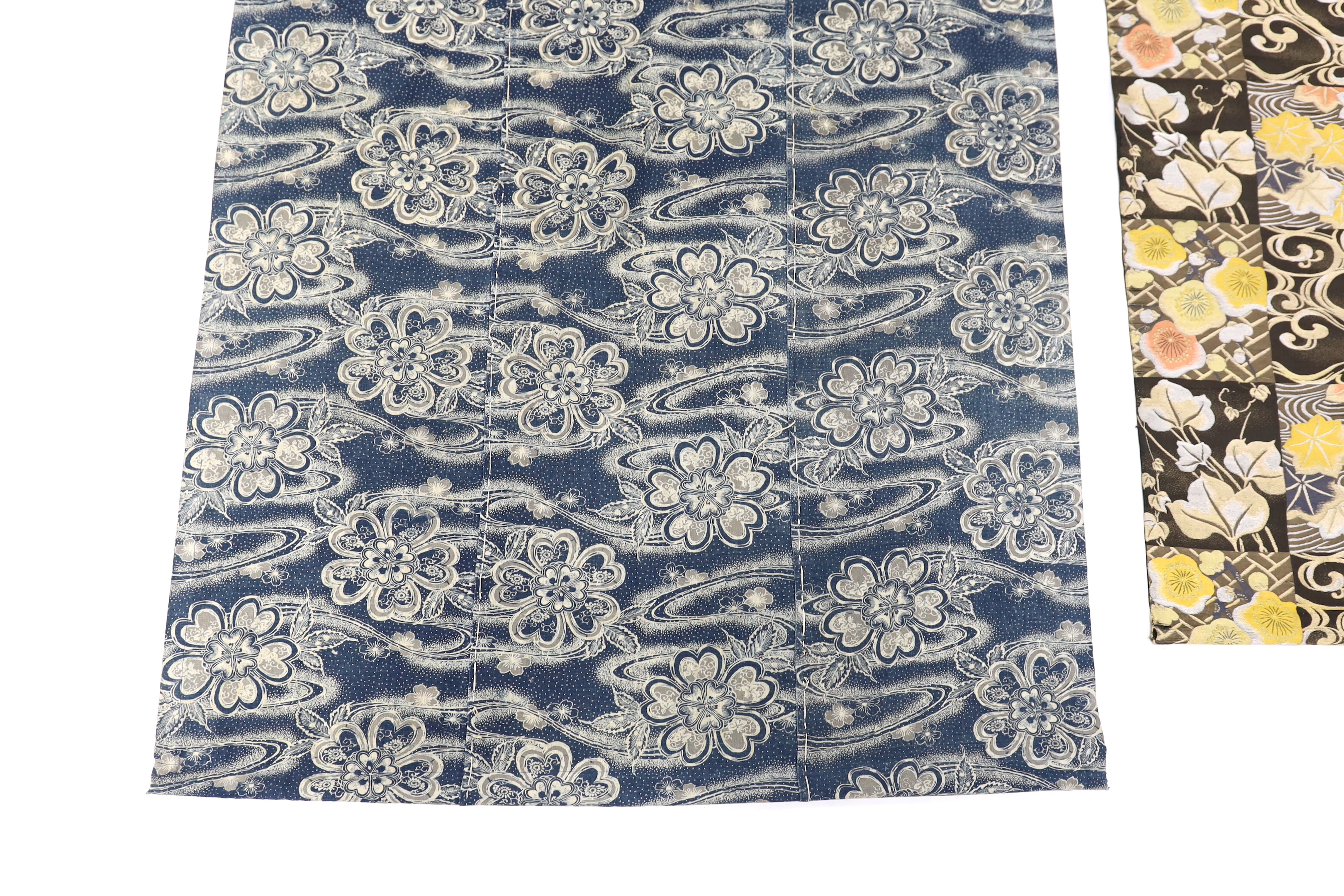 A Japanese blue-printed banner and part of a Japanese silk brocade Obi converted to a hanging, Obi 110cm long, (2)